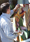 Canadian artist, Oliver Ray, painting outdoors.